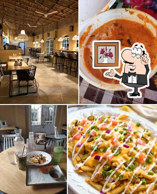 Take a seat at one of the tables at The Atrium By Filha Do Pai