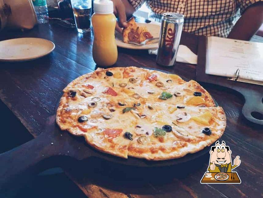 Get pizza at Cafe Ivy