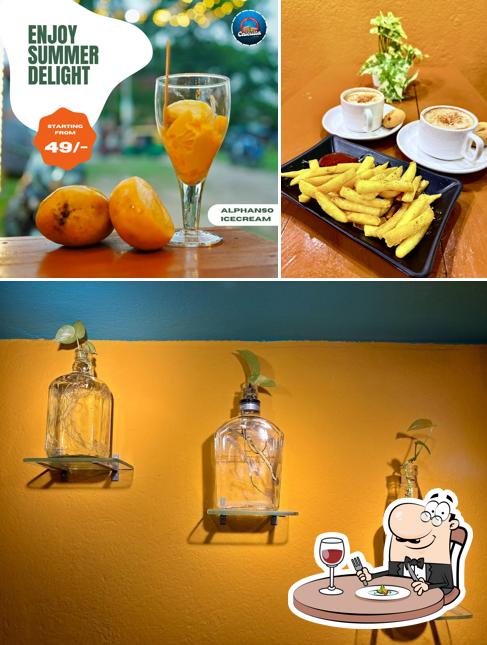 Take a look at the photo displaying food and beverage at Cafe Calcutta