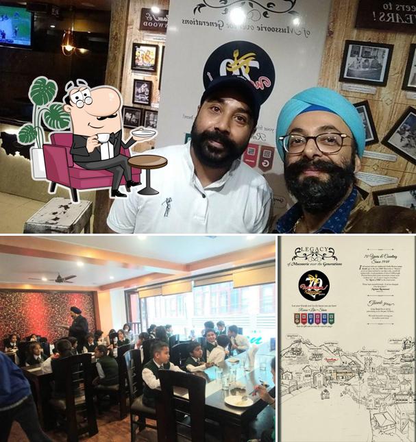 Take a seat at one of the tables at Neelam Restaurant