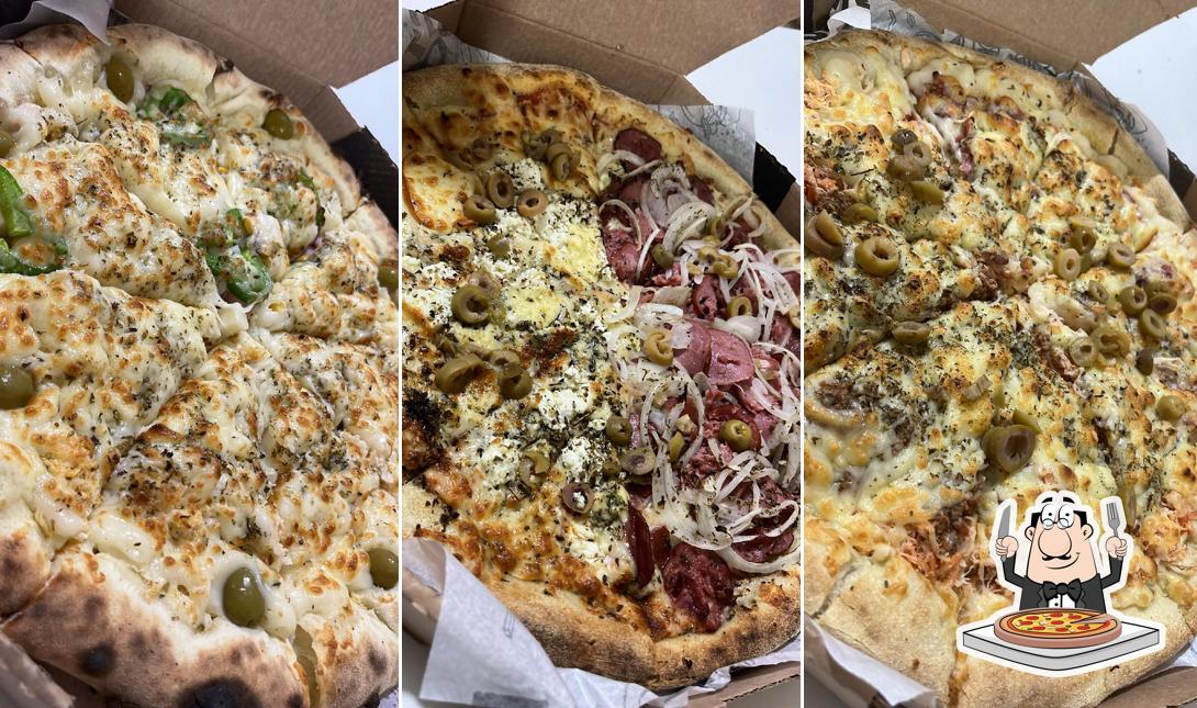 No TOP PIZZA ASSADA - DIVINÓPOLIS, você pode degustar pizza