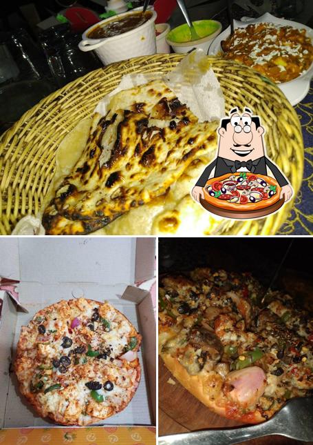 Get pizza at The Little Chef Restaurant