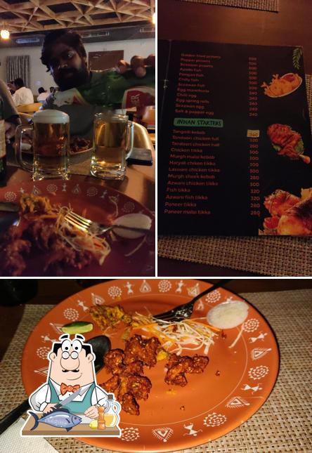 Grilled salmon at SAINI’S VINTAGE FAMILY RESTAURANT & BAR