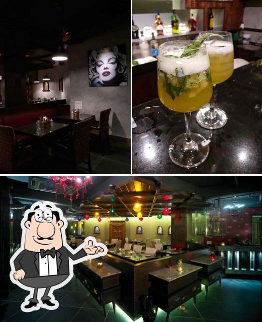 Take a seat at one of the tables at The Grey Room Pune (TGR) - Kitchen & Bar