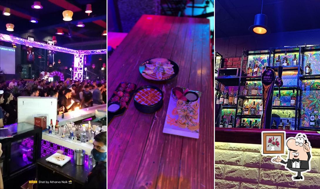 Take a seat at one of the tables at Rude Lounge