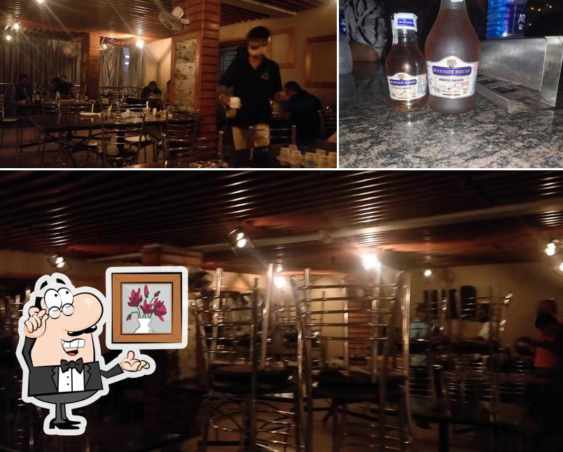 The picture of Swargaloka Bar,Pub & Fine dining’s interior and beverage