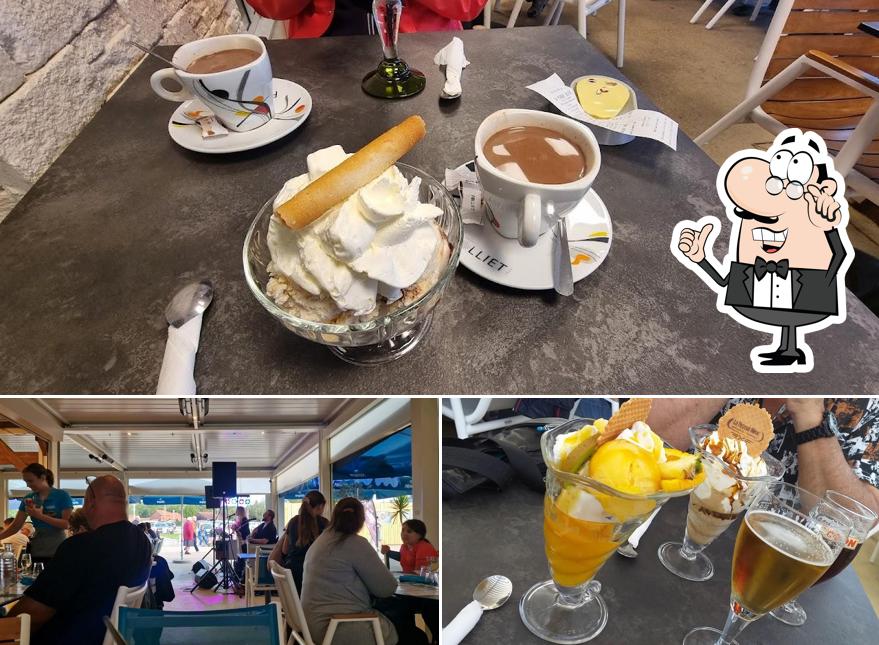 L’image de la intérieur et nourriture concernant La Pirogue Bleue