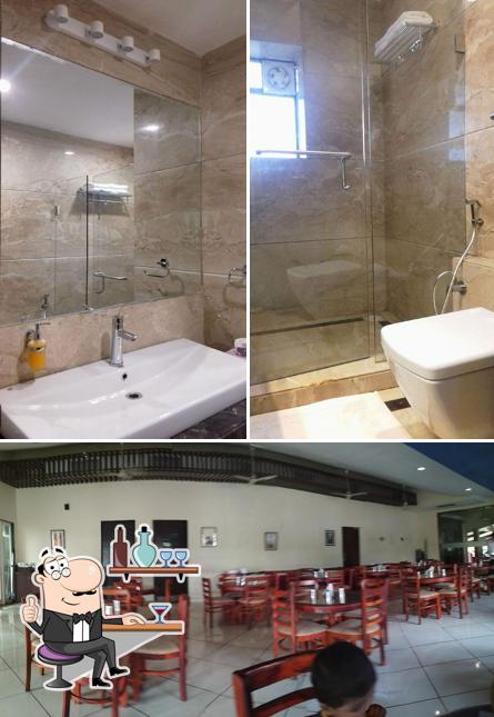 Take a seat at one of the tables at Manas Resort, Igatpuri [Petting Zoo and Organic Farm]