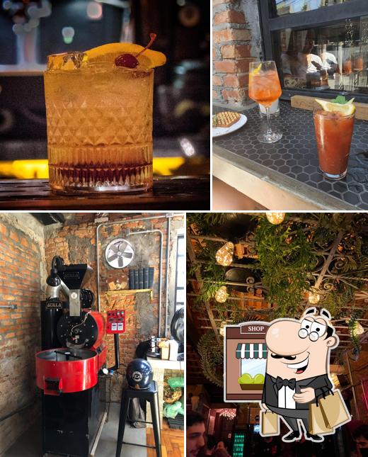 A foto do Café Hotel no Mojo Society’s exterior e bebida