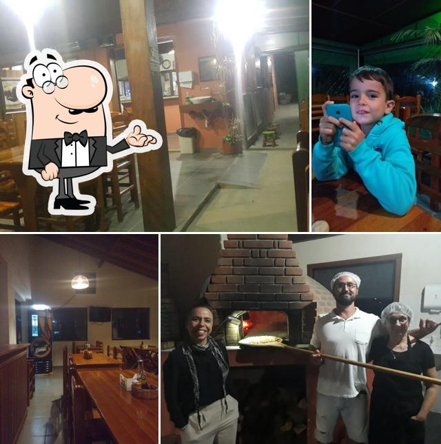 O interior do Pizzaria Varanda das Palmeiras