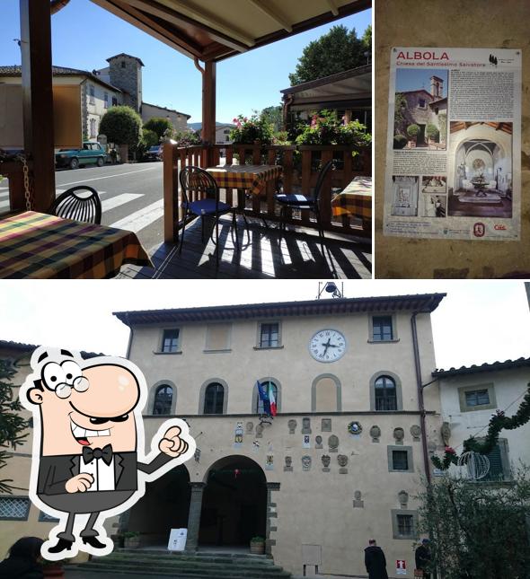 Puoi goderti l'aria fresca da seduto all'esterno di Pizza Pie