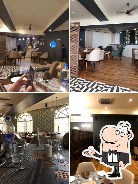 Take a seat at one of the tables at Moti Mahal Delux, Maximus mall