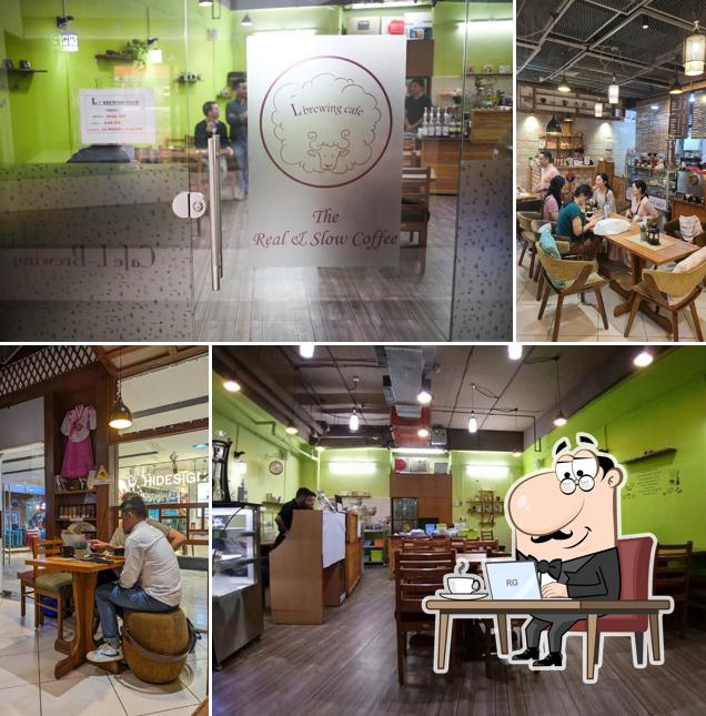 Take a seat at one of the tables at L-Brewing Cafe