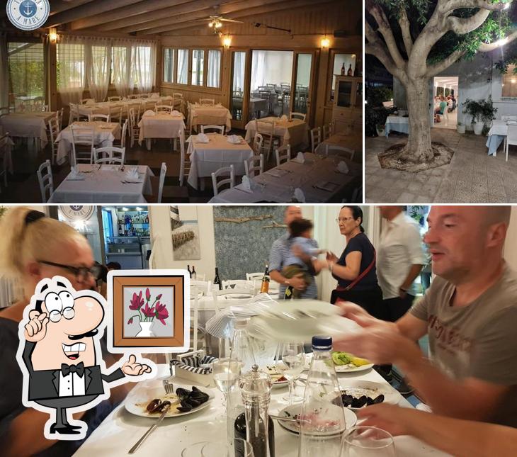 Dai un'occhiata agli interni di Taverna a Mare