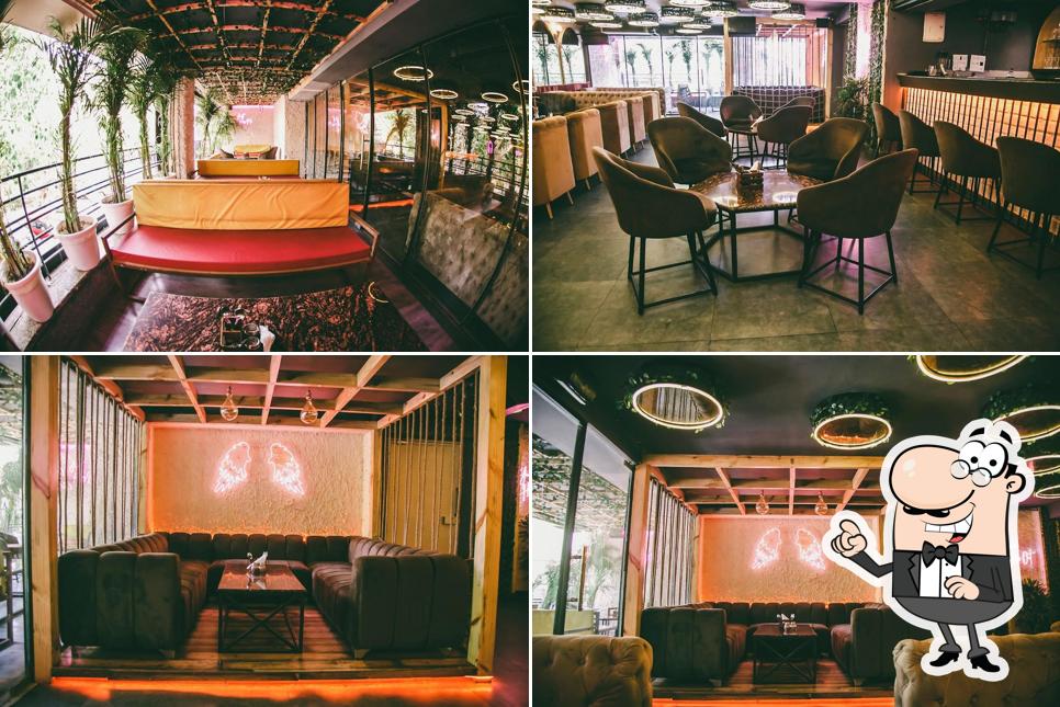 Take a seat at one of the tables at your Hide Out Cafe