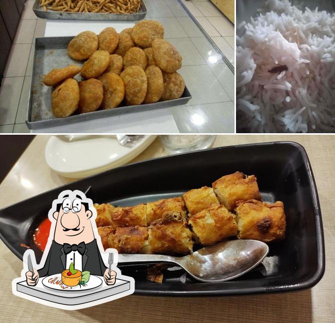 Among various things one can find food and exterior at Kumar Sweet Shop and Restaurant