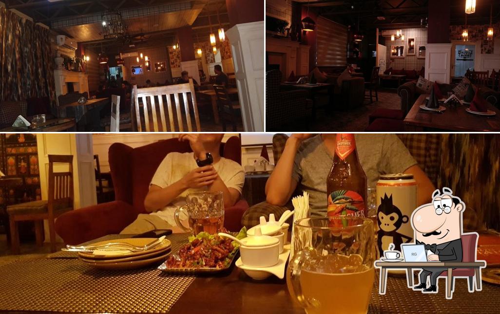 Take a seat at one of the tables at M.K.T HUB RESTAURANT