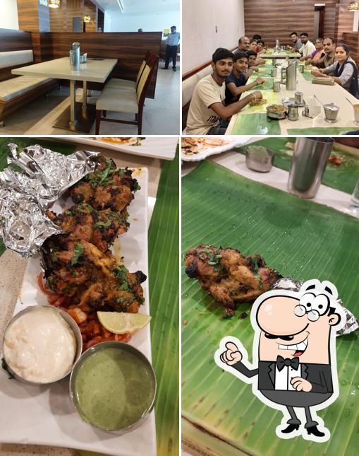 Check out the picture depicting interior and food at Junior Sri Surya hotel