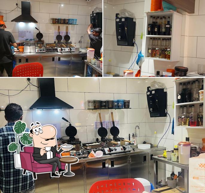 Take a seat at one of the tables at The Waffle Co