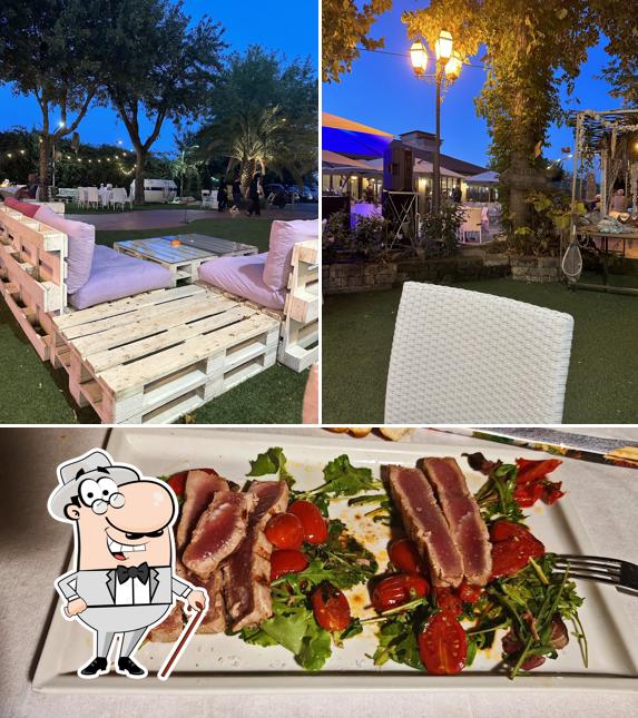 La immagine di esterno e cibo da Alla Fattoria