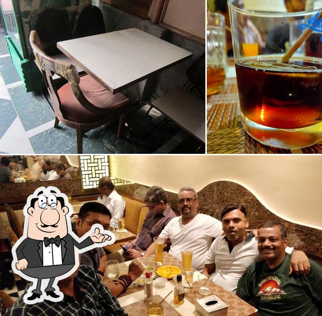 The picture of interior and beverage at Poornima Restaurant And Bar