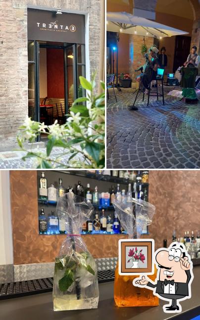 La immagine di interni e bevanda da Café Trentatré
