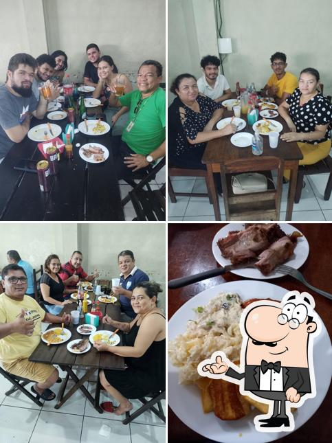 O interior do Churrascaria do TCHÊ BRASA NA BOTA, coroado 1