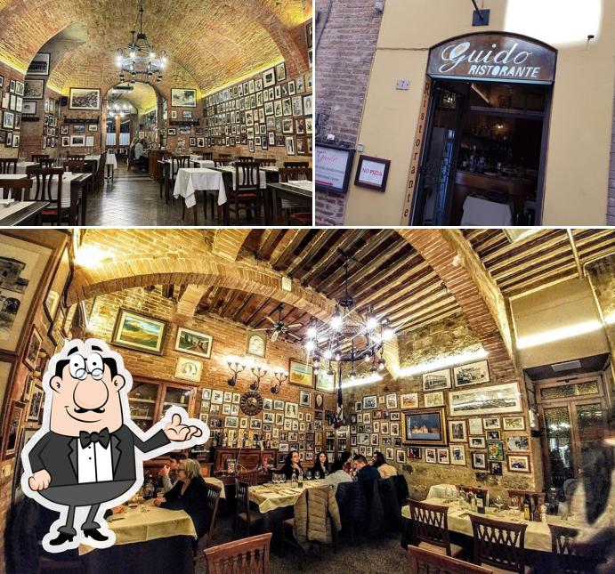 Questa è la foto che mostra la interni e bancone da bar di Pier Pettinaio ristorante a Siena