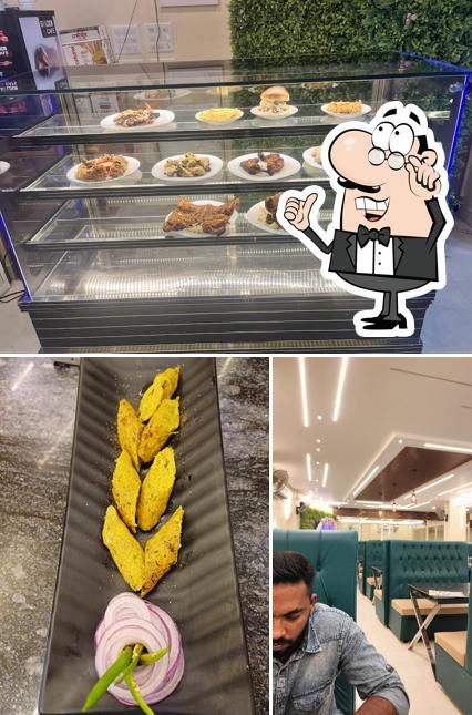 This is the picture showing interior and food at Rafi's Majlis Mandi Restaurant