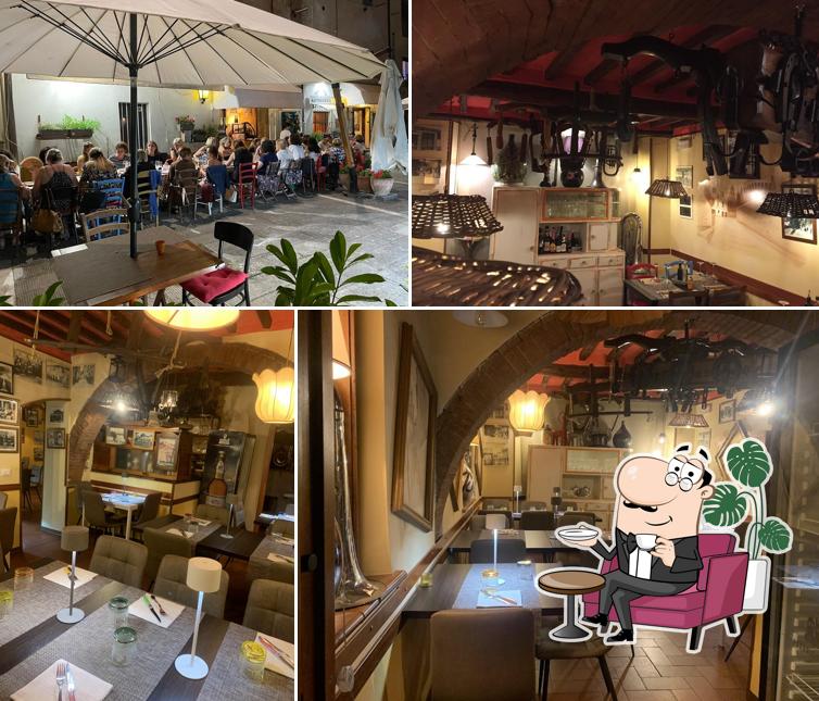 Dai un'occhiata agli interni di Pizzeria Trattoria Artigiana