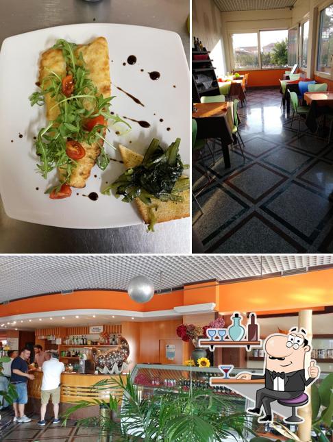 Dai un’occhiata alla foto che presenta la interni e cibo di Bar Fizz