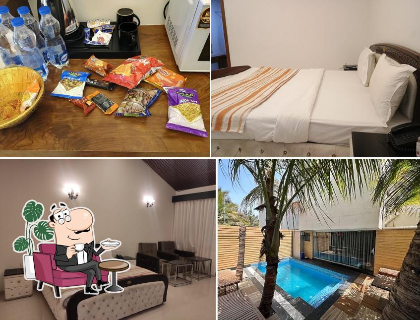 Take a seat at one of the tables at Anand Resort - A Luxury Private Pool Resort in Nashik