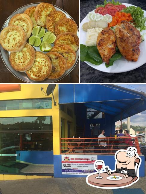 Entre diversos coisas, comida e exterior podem ser encontrados no Pizzaria e restaurante Bella Bari