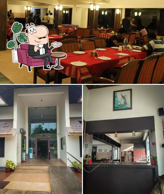 Take a seat at one of the tables at Shadrasa Restaurant