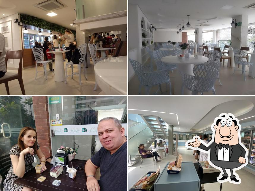 Sente em uma das mesas no Perdomo Doces - Loja Matriz