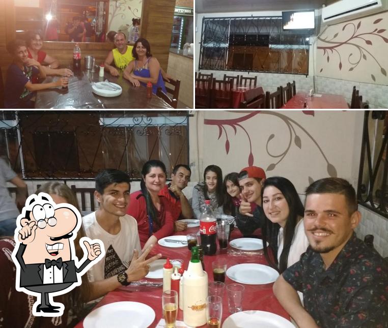 O interior do Pizzaria Dom Camilo