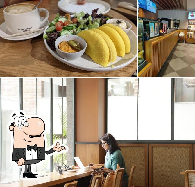 Check out the picture displaying interior and food at Third Wave Coffee