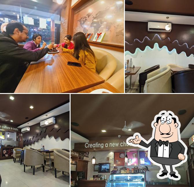 Take a seat at one of the tables at The Chocolate Room Best Chocolate Dessert in Ranchi Best Coffee in Ranchi