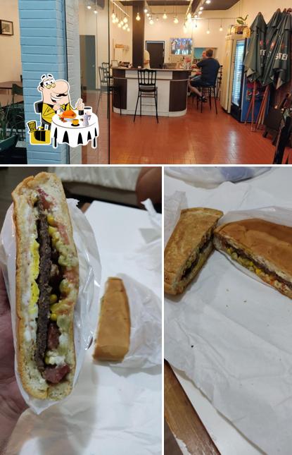 A ilustração da comida e interior no 1000TON LANCHES