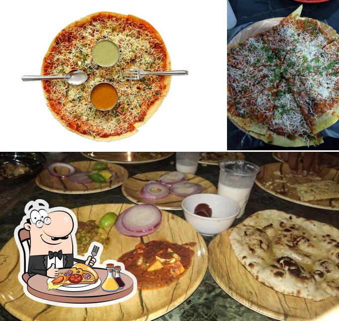Pick pizza at Diya Dosa Center