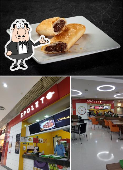 Dê uma olhada a imagem mostrando interior e sobremesa no Restaurante Spoleto