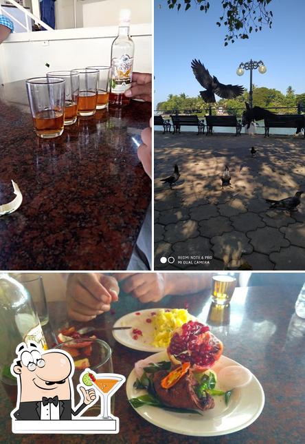 The photo of Corner Bar’s drink and interior