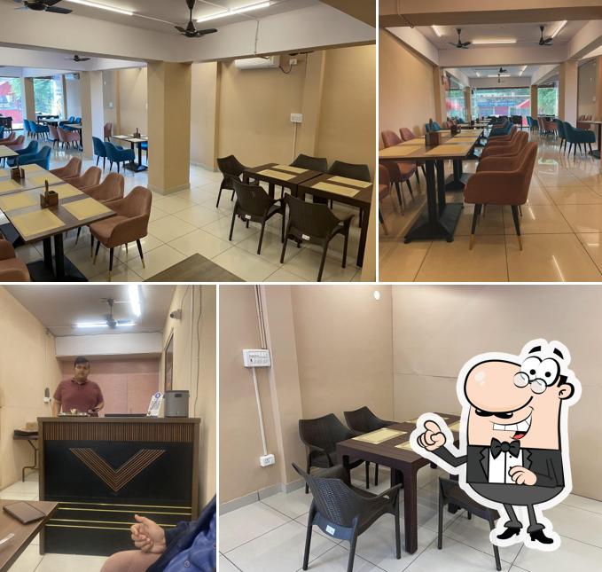 The interior of Nivediyam Restaurant and Om Shree Mithai