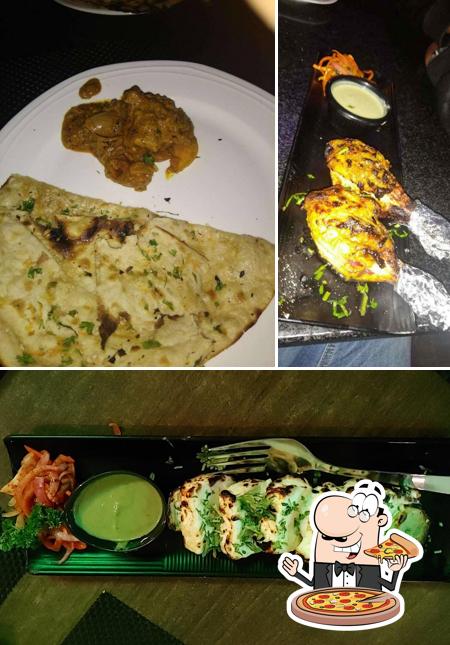 Try out pizza at TRIPLE EIGHT Rooftop Bar & Kitchen