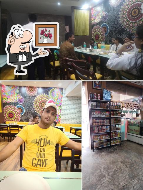 The interior of New JalaRam Sweets and Restaurant