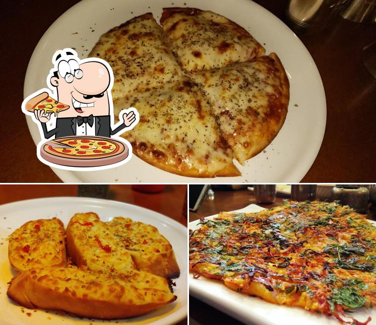 Get pizza at Sankalp Restaurant