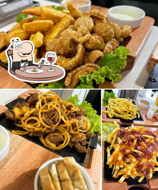 Comida em Brasiliana Pizzaria & Adega dos Amigos - Restaurante Bar Petiscaria Pizzaria Marmitex Lanches Porções Bebidas