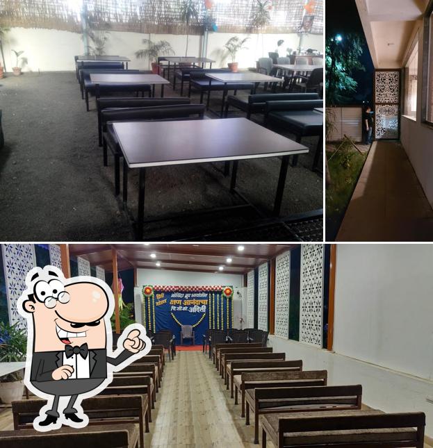 Take a seat at one of the tables at Le Garlic Family Restaurant