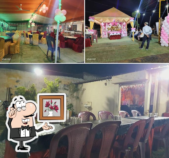 Take a seat at one of the tables at MAA WAINGANGA RESTAURANT GARRA BALAGHAT MP