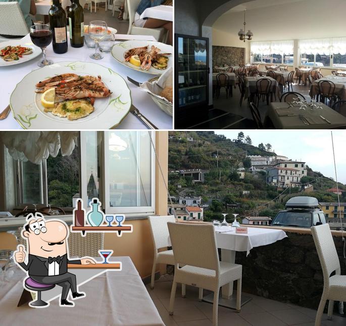 Questa è la foto che presenta la interni e tavolo da pranzo di Ristorante Ripa del Sole Riomaggiore